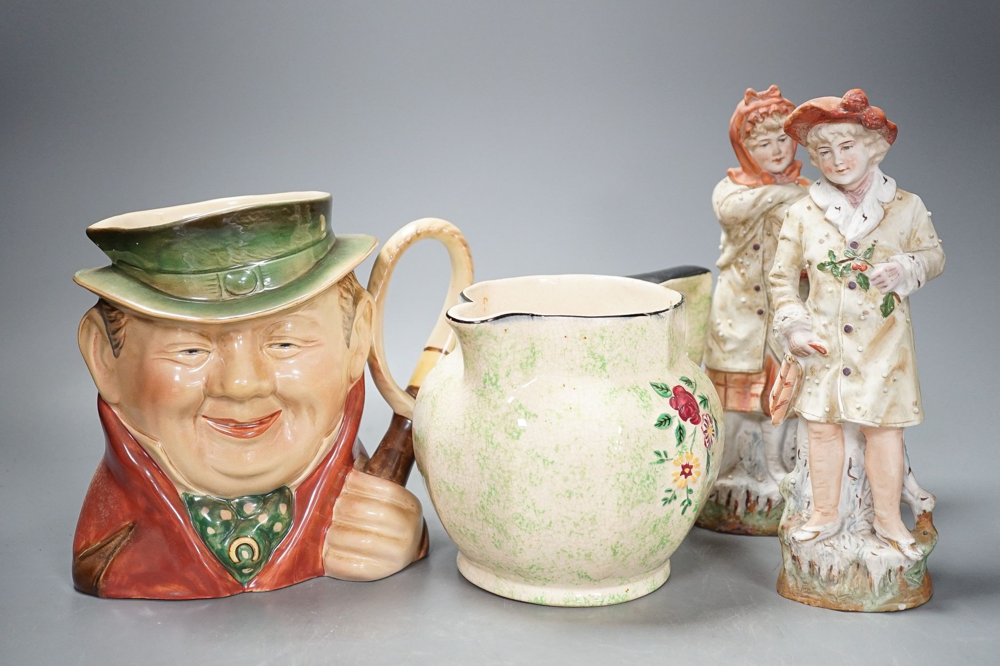 A Royal Doulton character jug and 6 other pieces including a Staffordshire figure group, tallest 25cm